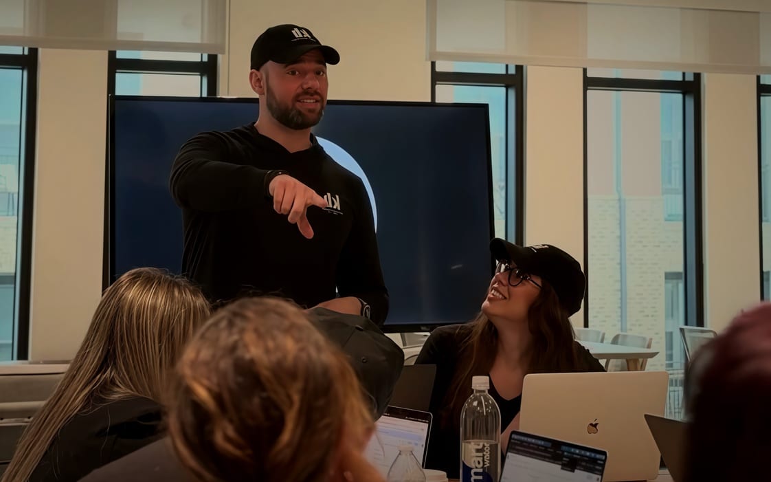 Chris Michael Harris teaching at a live event alongside Kim Jimenez
